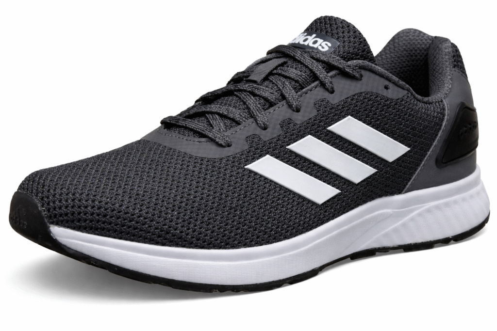 A sleek black Adidas sports shoe designed for everyday training and running, featuring a breathable mesh upper, supportive fit, and cushioned sole that delivers strong comfort and reliable performance with zero compromise on style.
